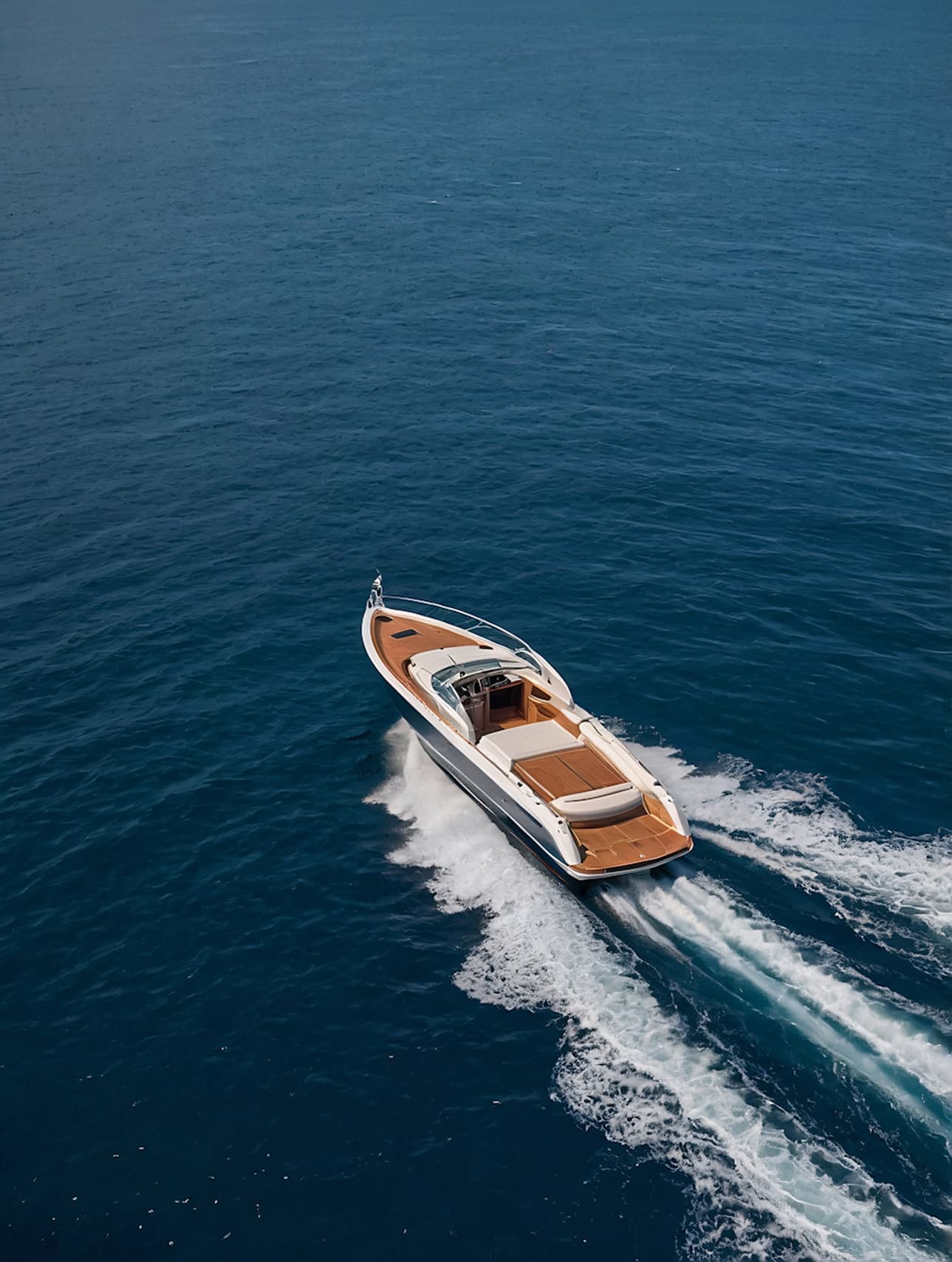 Elegant boat scene in Sardinia with deep blue water and refined coastal mood