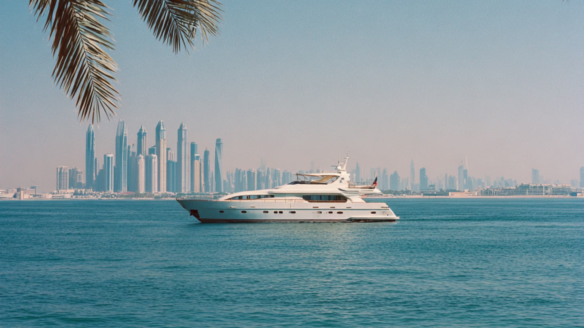 Sailing yachts racing near Porto Cervo during a corporate regatta in Sardinia